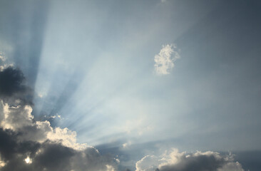 dramatic sky with sun beam