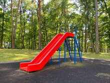 Children's Playground. A Slide For Children To Ride. Equipped Children's Playground