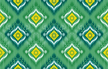 Wall Mural - Ikat ethnic seamless pattern design. Aztec fabric carpet mandala ornament boho chevron textile decoration wallpaper. Tribal traditional embroidery patterns vector illustrations background.