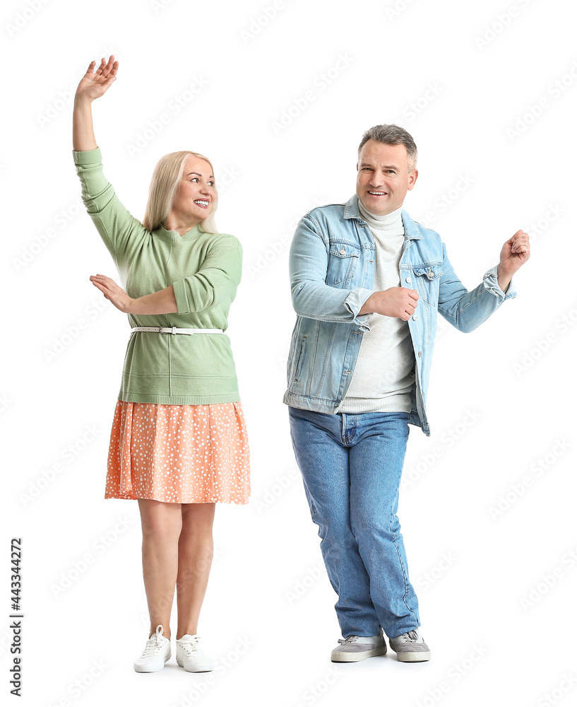 Dancing mature couple on white background