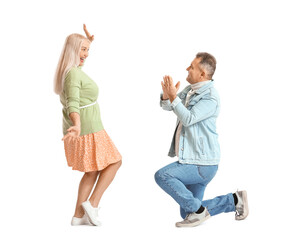 Canvas Print - Dancing mature couple on white background