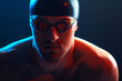 © likoper - Male swimmer posing. Swimming concept photo.