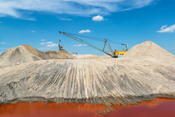 Walking excavator in the titanium quarry