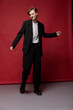 © monchak - a guy posing in a black casual suit and white t-shirt