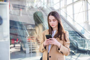 Business woman talking on smart phone. Business people office worker talking on smartphone smiling happy. Young multiracial caucasian female professional outside.