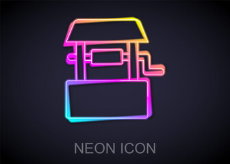 Sticker - Glowing neon line Well icon isolated on black background. Vector