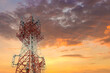 © kanpisut - communication tower top. Radio antenna Tower , microwave antenna tower on light sky background. wireless technology concept. communication development concept. image for objects and article.