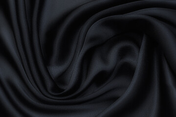 Wall Mural - Silk fabric in black in artistic layout. Texture, background, pattern.