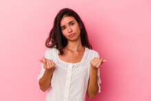 Young Caucasian Woman Isolated On Pink Background Showing That She Has No Money.