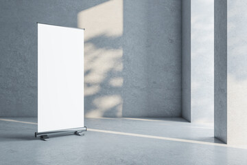 Empty concrete room interior with sunlight and blank banner. Mock up, 3D Rendering.