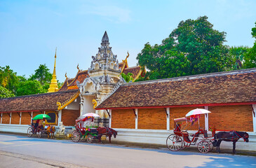 Sticker - The carriages at the gate of Wat Phra That Lampang Luang Temple, Lampang, Thailand