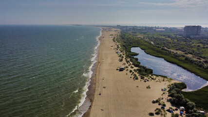 Wall Mural - View of the Black Sea and sandy beach in Karolino-Bugaz. Salt Lake. Ukraine. Europe	