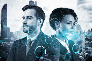 Wall Mural - Businessman and businesswoman as a part of corporate team pondering about technology as a business necessity for tremendous growth in commerce. Tech hologram icons over Bangkok background.