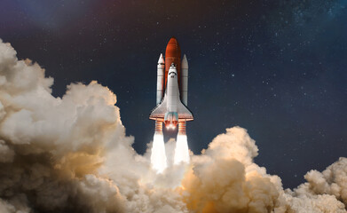 Leinwandbilder - Space shuttle launch in the clouds to outer space. Dark space with stars on background. Sky and clouds. Spaceship flight. Elements of this image furnished by NASA