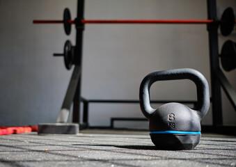 closeup image of a gym interior with equipment. an 8kg kettbell. healthy ideas concept.