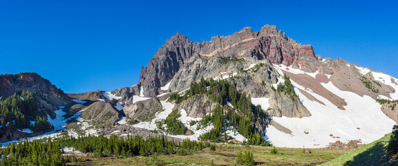 Wall Mural - wide panoramic view of volcanic mountain landscape in the summer.
