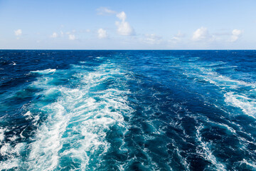 Wall Mural - Trail from the movement of the vessel at sea. Water movement.