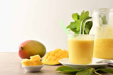 Wall Mural - Breakfast with natural mango juice with milk isolated background