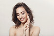 © racool_studio - The beautiful girl is having a photo session in the studio in a night dress.