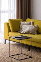 Wall Mural - Stylish black coffee table and modern yellow couch