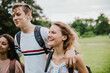 © Rawpixel.com - Cheerful teenagers walking in the park