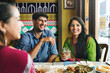 © Rawpixel.com - A group of Indian people is having lunch together