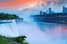 Overview Of Niagara Falls With Beautiful Sunset, Niagara Falls  Is A Group Of Three Waterfalls At The Southern End Of Niagara Gorge, In New York State USA