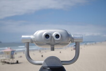 Close-up Of Coin-operated Binoculars Against Sky