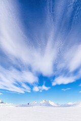 Wall Mural - snow mountains and big sky, svalbard