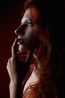 © Oleh - redhead woman, girl in a dark key, sexy and painted red lips