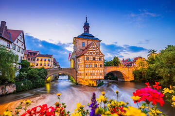 Bamberg, Germany. Town Hall of Bamberg (Altes Rathaus) with two bridges over the Regnitz river. Upper Franconia, Bavaria.