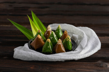 Close up Thai style dessert called Kalamare or Thai caramel, made from flour,coconut milk and sugar,Thai sweet caramel sugar candy.