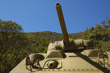 American M4 Sherman world war II tank with in the background the Monte Soratte fallout shelter of Sant'Oreste , Rome , Italy