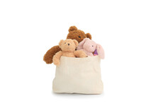 Dolls In A Cloth Bag For Donation Isolated On White Background. Image With Clipping Path