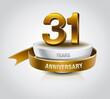 31 years golden anniversary logo celebration with ring and ribbon.
