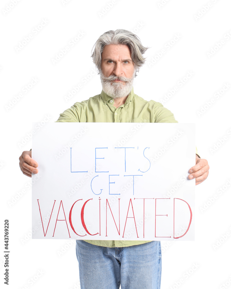 Senior man holding poster with text LET'S GET VACCINATED on white background