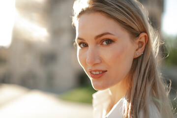 Canvas Print - Close up portrait of young businesswoman outdoors