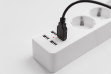 A Versatile Modern White Extension Cord With Sockets And Usb Ports