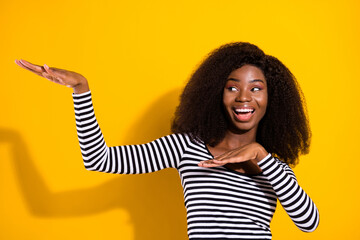 Sticker - Photo portrait of curly woman dancing at party relaxing on weekend looking copyspace isolated vibrant yellow color background