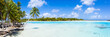 © JCB - Panorama of a blue lagoon on a tropical island