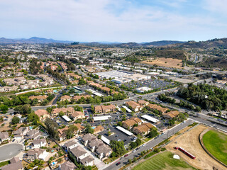 Wall Mural - Aerial view of San Marcos neighborhood with houses and street during sunny day, California, USA.