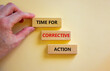 © Dzmitry - Time for corrective action symbol. Wooden blocks with words 'Time for corrective action' on a beautiful white background. Businessman hand. Business, time for corrective action concept. Copy space.
