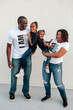 © Erin Brant/Stocksy - Laughing Black family