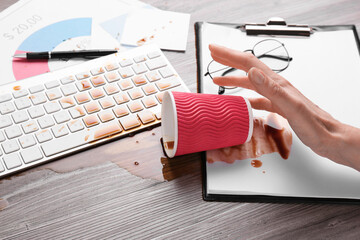 Poster - Woman with coffee spilled over her workplace, closeup