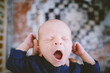 © Jeremy Pawlowski/Stocksy - Tired Baby