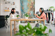 © Studio Marmellata/Stocksy - Creative women recording podcast together