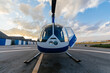 © Marcos Osorio/Stocksy - Small helicopter on the runway