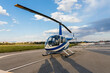 © Marcos Osorio/Stocksy - Small helicopter on the runway