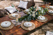 © Ezequiel Giménez/Stocksy - Decorated table for wedding dinner.