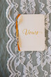 © Simone Anne/Stocksy - Vows booklet on lace